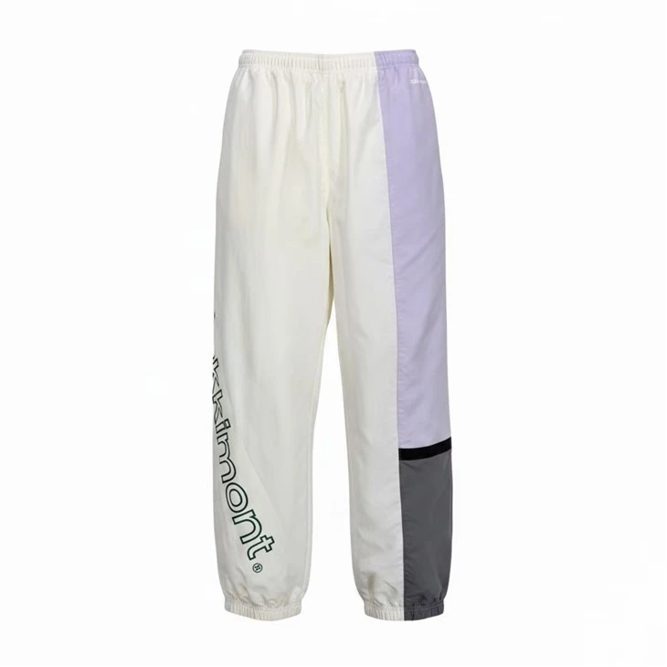 Pantaloni de sport cu logo brodat în bloc de culoare